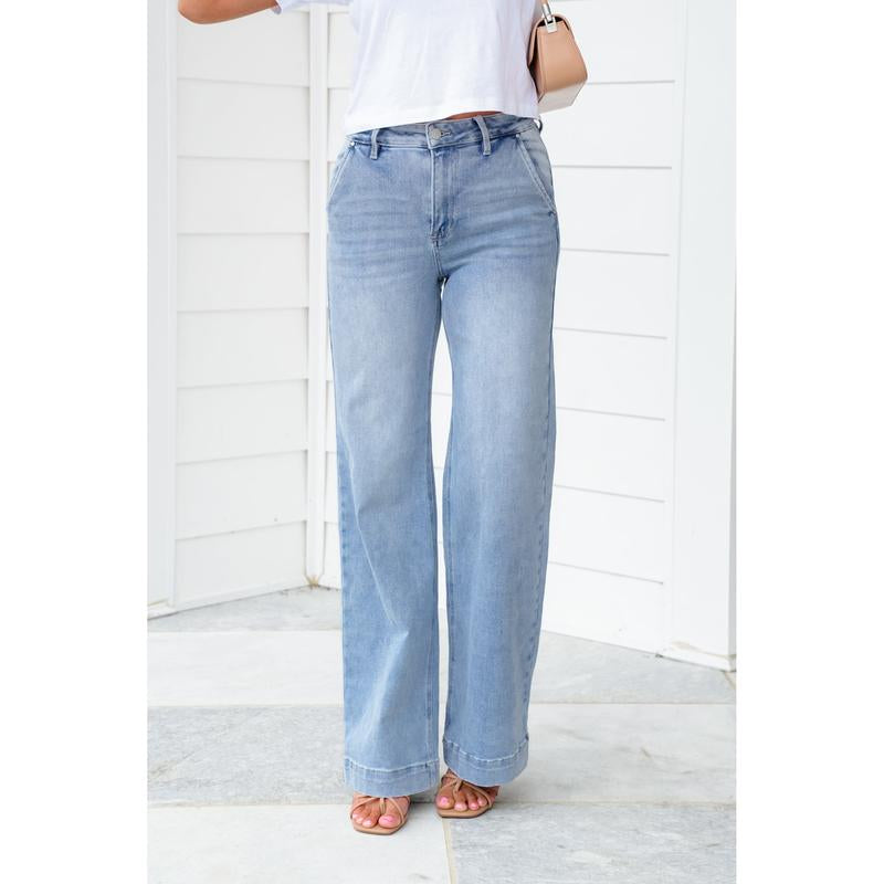 Risen High Rise Light Wash Wide Leg Jeans with Slanted Pockets